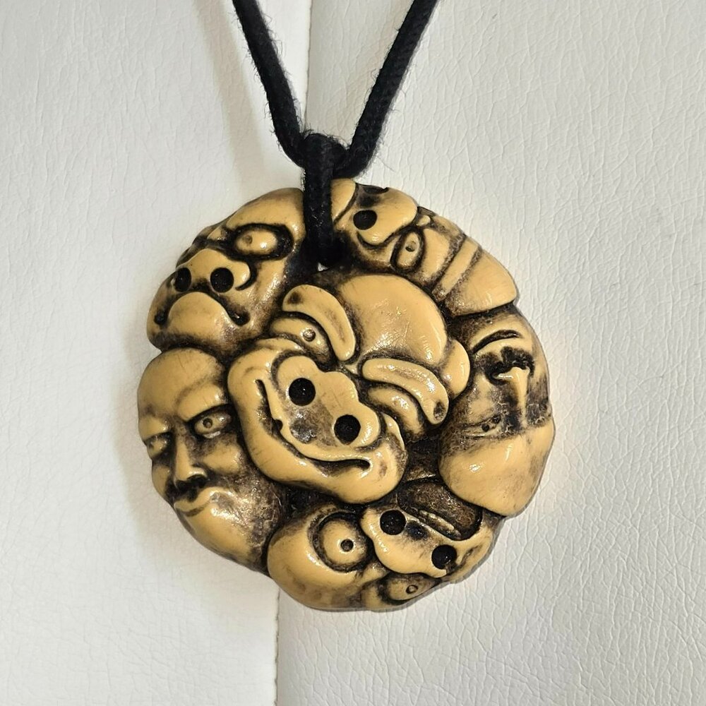Vintage Carved Faces Pendant Necklace On Black Cord 22" HS226